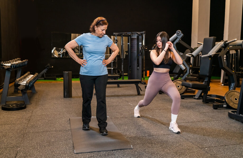 Senior woman working out with her physiotherapist